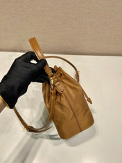 BUCKET BAG 19 IN RUSSET BROWN RE-NYLON AND CALFSKIN HANDLE