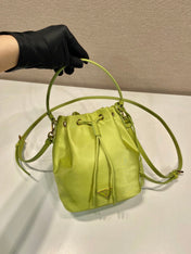 BUCKET BAG 19 IN APPLE GREEN RE-NYLON AND SAFFIANO LEATHER HANDLE