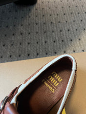 MIUMIU 26S FRINGE BUCKLE LOAFERS IN BROWN CALFSKIN