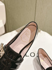 MINI BROCHE VIVIER BUCKLE LOAFERS IN BLACK PATENT CALFSKIN