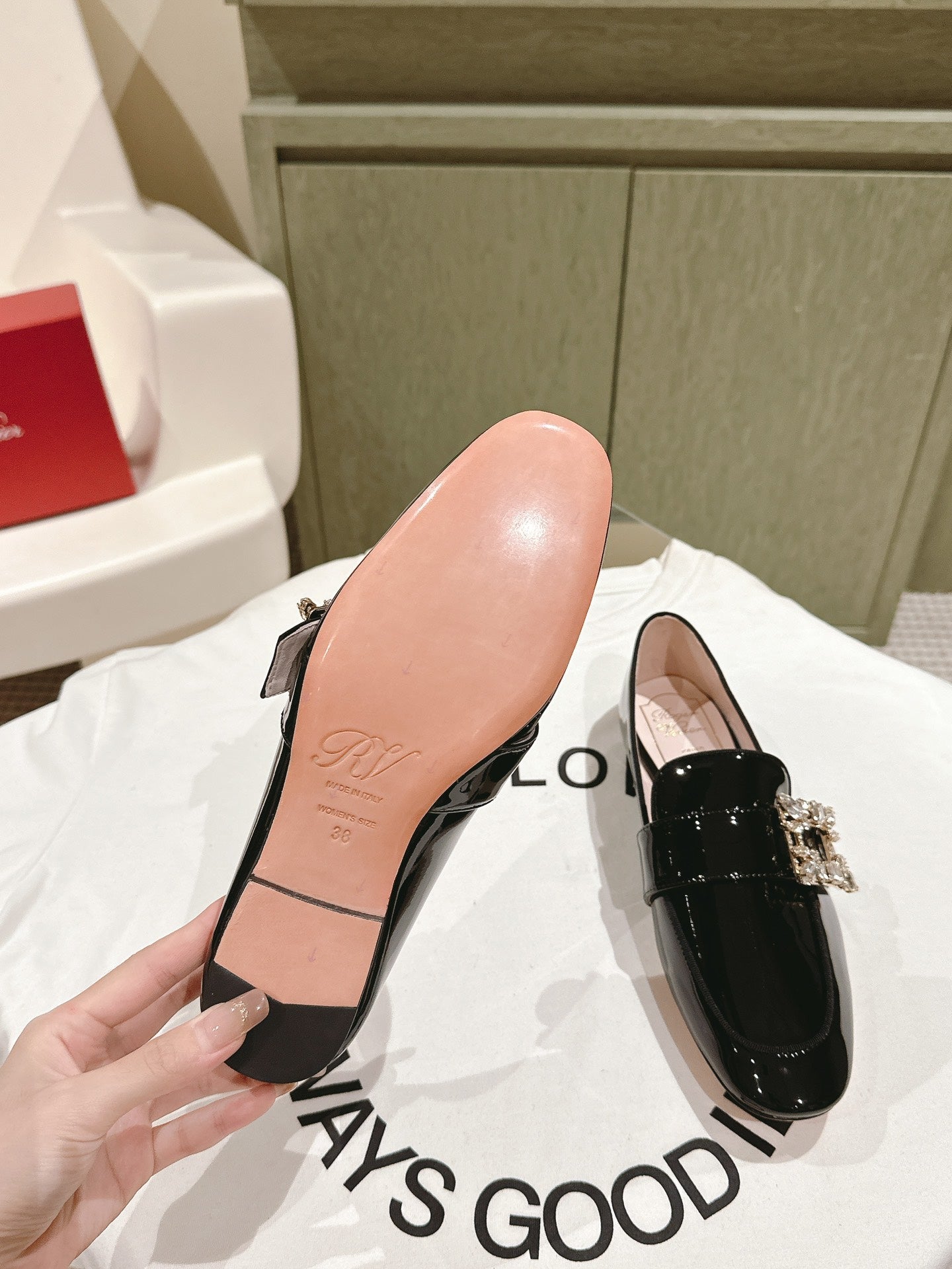 MINI BROCHE VIVIER BUCKLE LOAFERS IN BLACK PATENT CALFSKIN