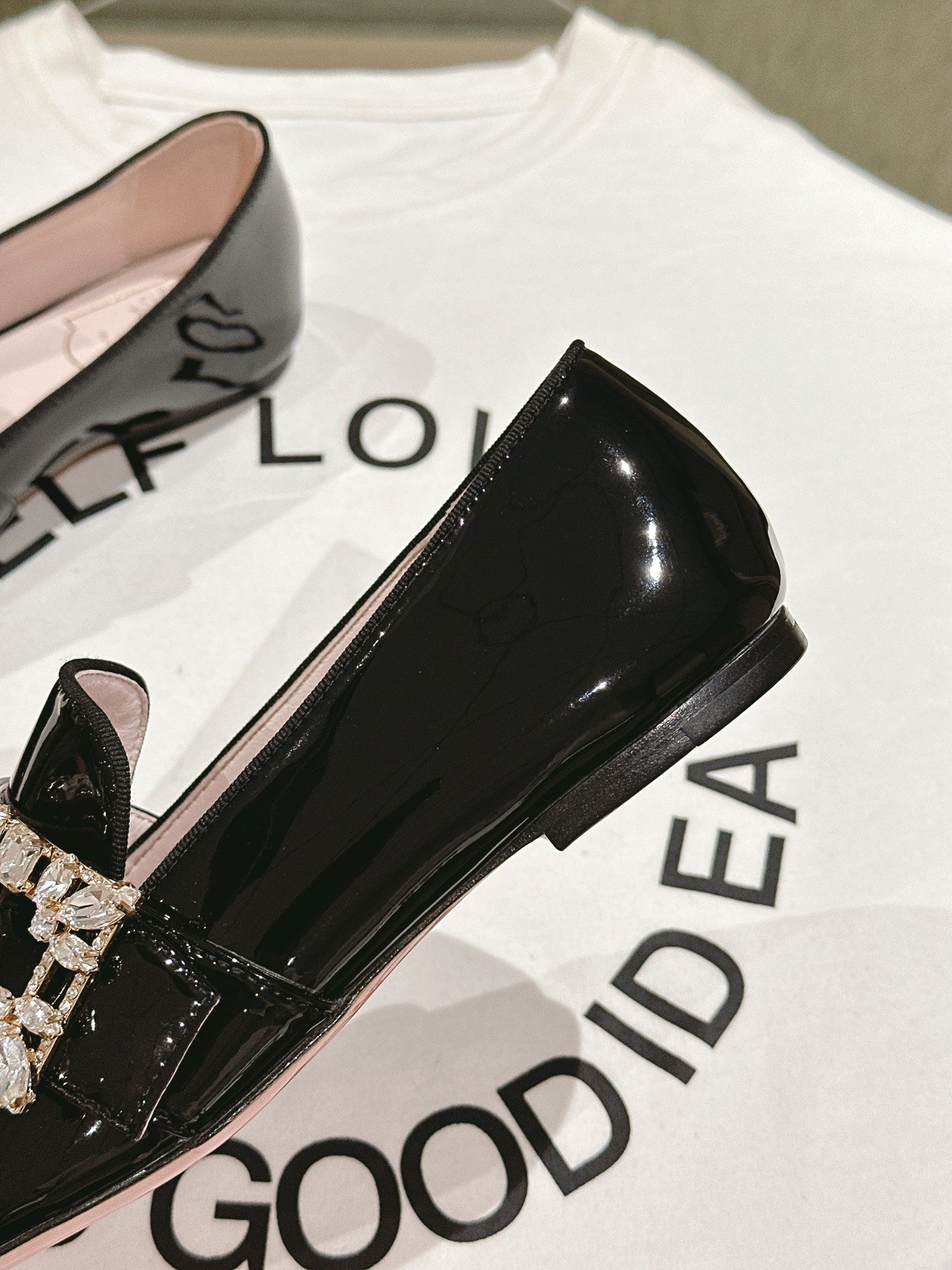 MINI BROCHE VIVIER BUCKLE LOAFERS IN BLACK PATENT CALFSKIN