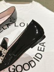 MINI BROCHE VIVIER BUCKLE LOAFERS IN BLACK PATENT CALFSKIN