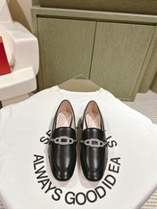 STRASS CHAIN LOAFERS IN BLACK CALFSKIN WITH CRYSTAL CHAIN DETAIL