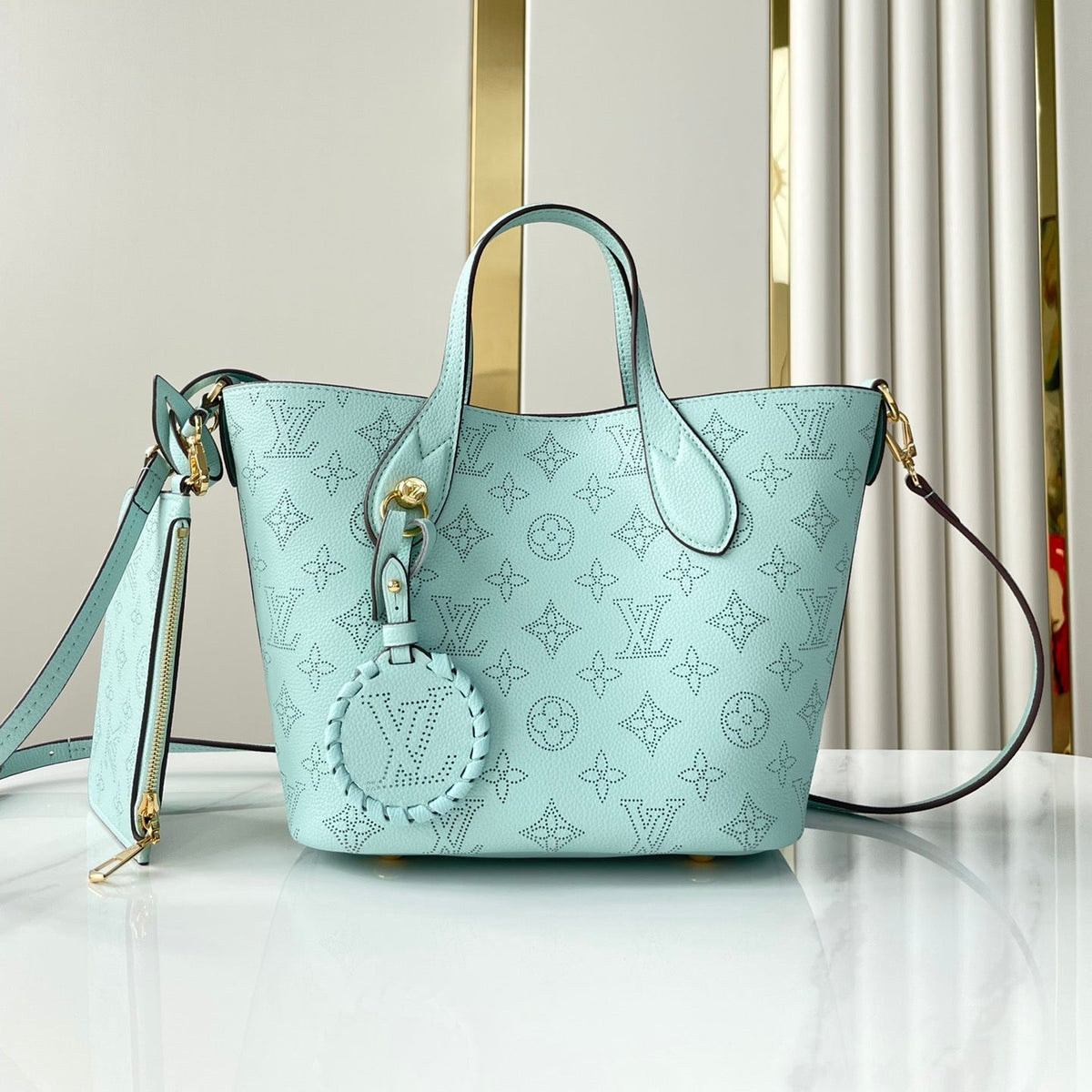 BLOSSOM PM 20 IN SKY BLUE MONOGRAM PERFORATED CALFSKIN