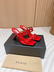 ALAIA TWO-STRAPS HIGH HEEL SANDALS IN CHERRY RED PATENT LAMBSKIN