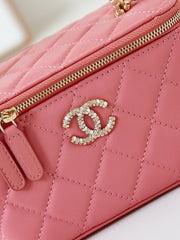 CHANEL 25S MINI VANITY BAG 16 CM IN PEACHY PINK LAMBSKIN WITH CRYSTAL-EMBELLISHED CC LOGO