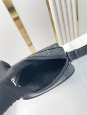 GETAWAY MESSENGER 18 IN GUN METAL MONOGRAM ECLIPSE CANVAS