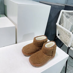 MINI ANKLE BOOT IN CHOCOLATE BROWN SHEARLING WITH ULTRA LIGHTWEIGHT RUBBER OUTSOLE