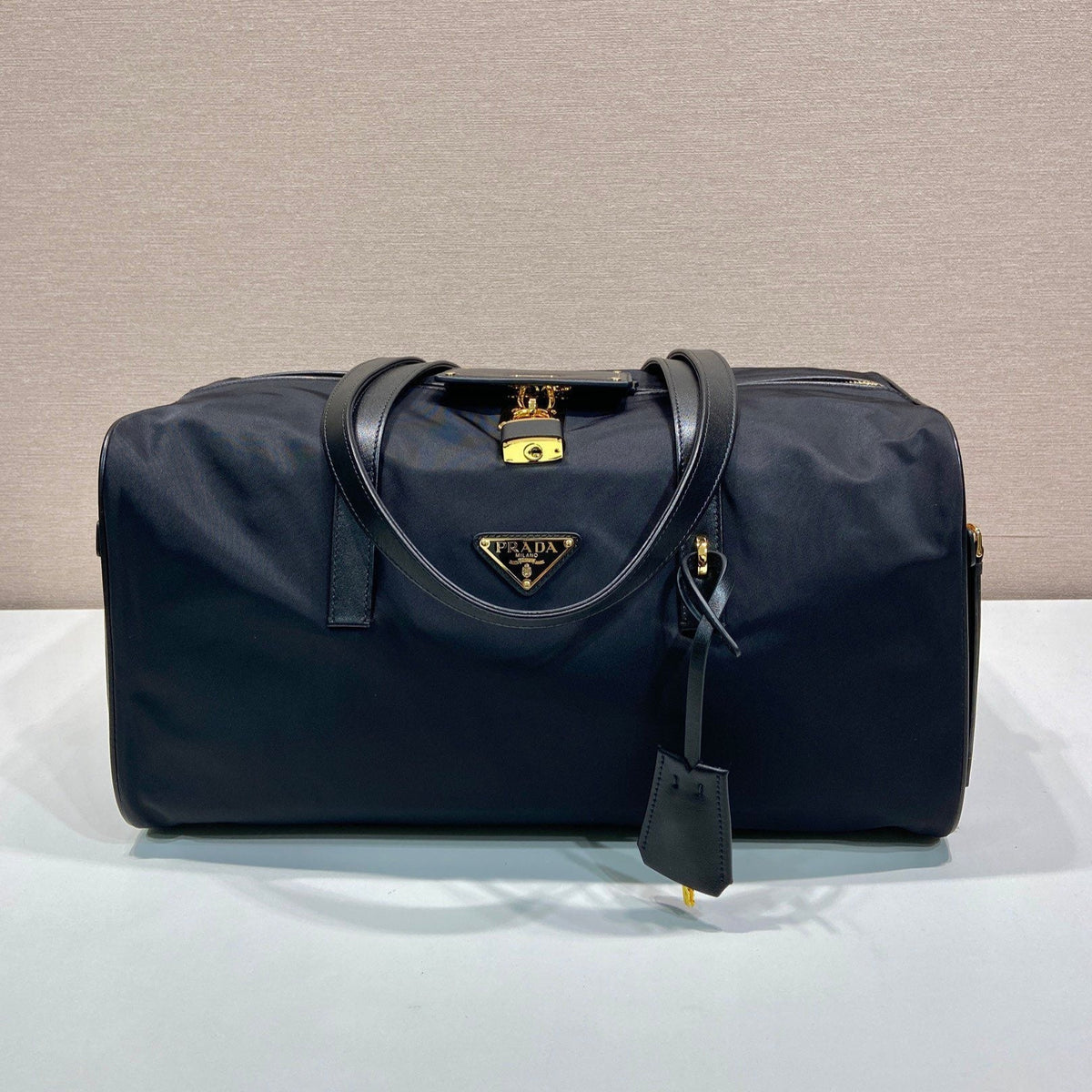 TRAVEL BAG 40 IN BLACK WATERPROOF FABRIC GOLD PADLOCK