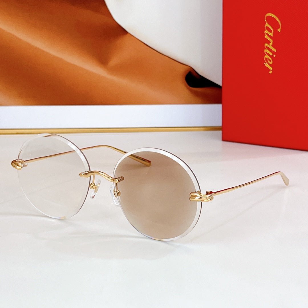 PREMIÈRE RIMLESS ROUND FRAME SUNGLASSES CT0475 IN METAL