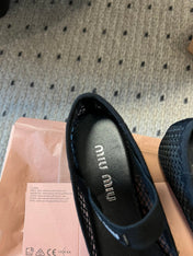 MIUMIU 26S BALLERINAS IN BLACK MESH FABRIC WITH BOW
