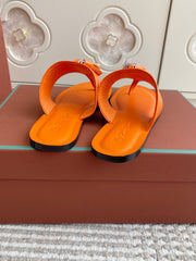 FLIP FLOPS IN ORANGE LAMBSKIN SNAKE EMBOSSING