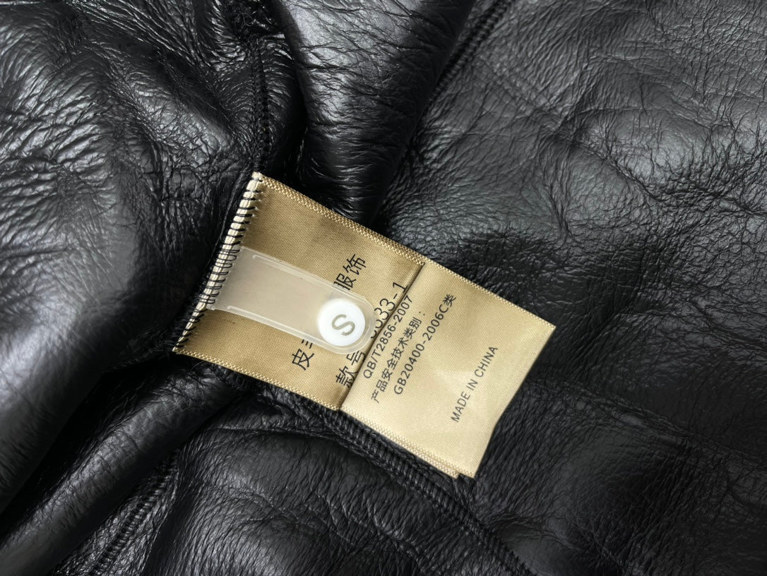 YSL 25S SHORT-SLEEVED SHEARLING COAT STYLE 231