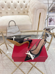 GARAVANI POINTED SLINGBACK PUMPS IN BLACK CALFSKIN