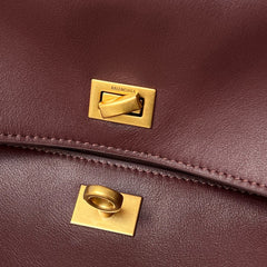 RODEO MEDIUM BAG 35 IN BURGUNDY SMOOTH CALFSKIN GOLD HARDWARE
