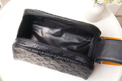 DOPP KIT TOILETRY BAG 28 CM IN BLACK TAURILLON MONOGRAM LEATHER