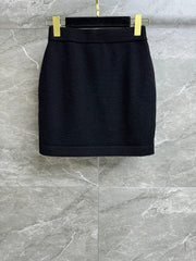 CC ICONIC SKIRT IN BLACK WOOL KNIT WITH FRONT POCKETS