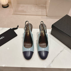 CC SLINGBACK PUMPS IN BLUE AND BLACK CALFSKIN
