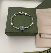 GG HEART AGED FINISH STERLING SILVER BLUE ENAMEL BRACELET