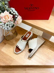 LACE-UP WEDGE SANDALS IN WHITE CALFSKIN WITH STUDS