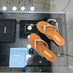 THONG SLIDE IN BRONZE BROWN SUEDE WITH WHITE CRYSTALS