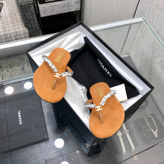 THONG SLIDE IN BRONZE BROWN SUEDE WITH WHITE CRYSTALS