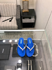 THONG SLIDE IN COBALT BLUE SUEDE WITH WHITE CRYSTALS