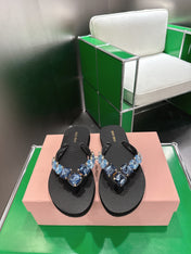 MIUMIU 26S THONG SANDALS IN BLACK EVA BLUE CRYSTAL-EMBELLISHED