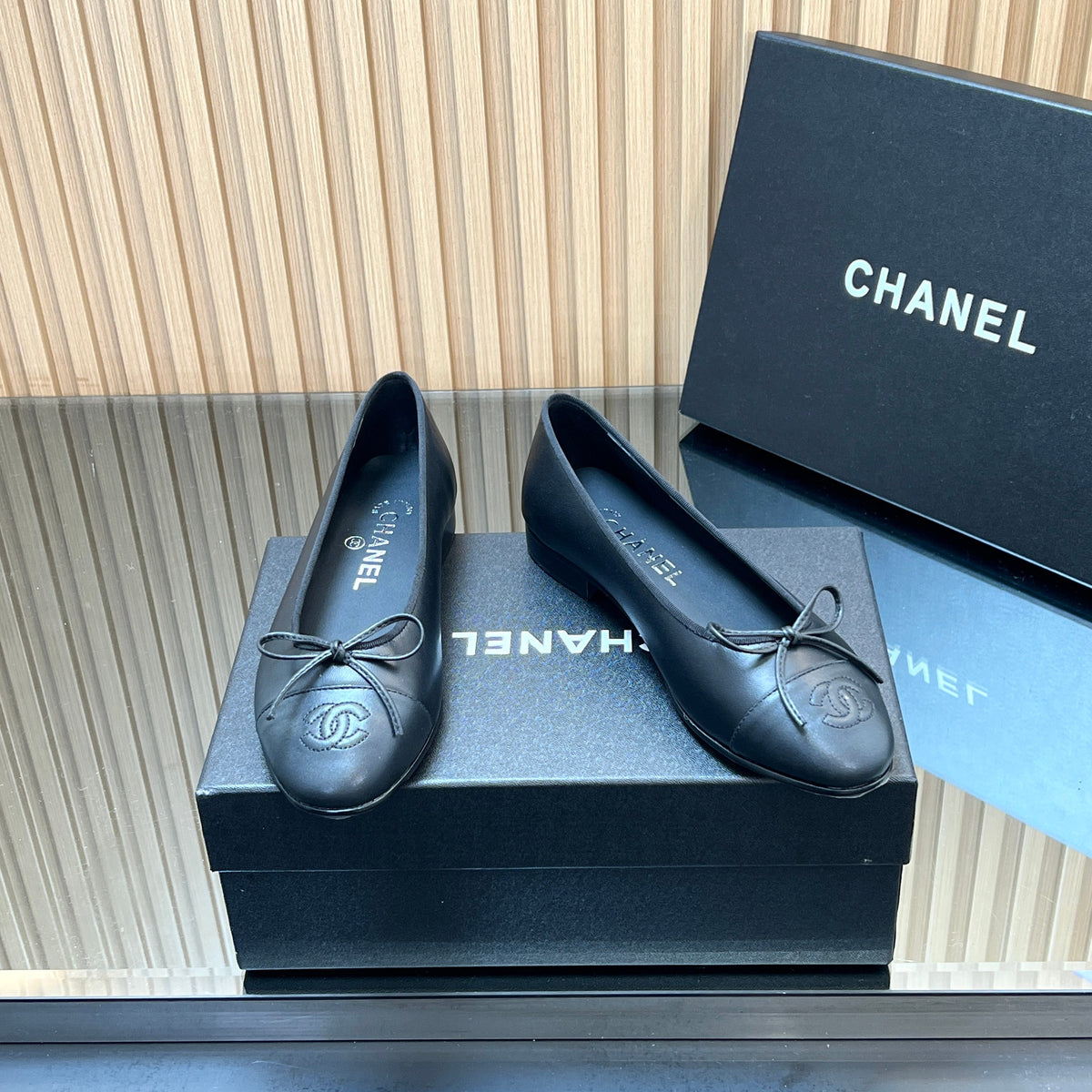 CHANEL 25S BALLET FLATS 20MM IN BLACK CALFSKIN WITH BOW