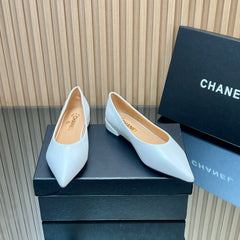 CHANEL 25S POINTED-TOE MARY JANE SHOES IN WHITE CALFSKIN