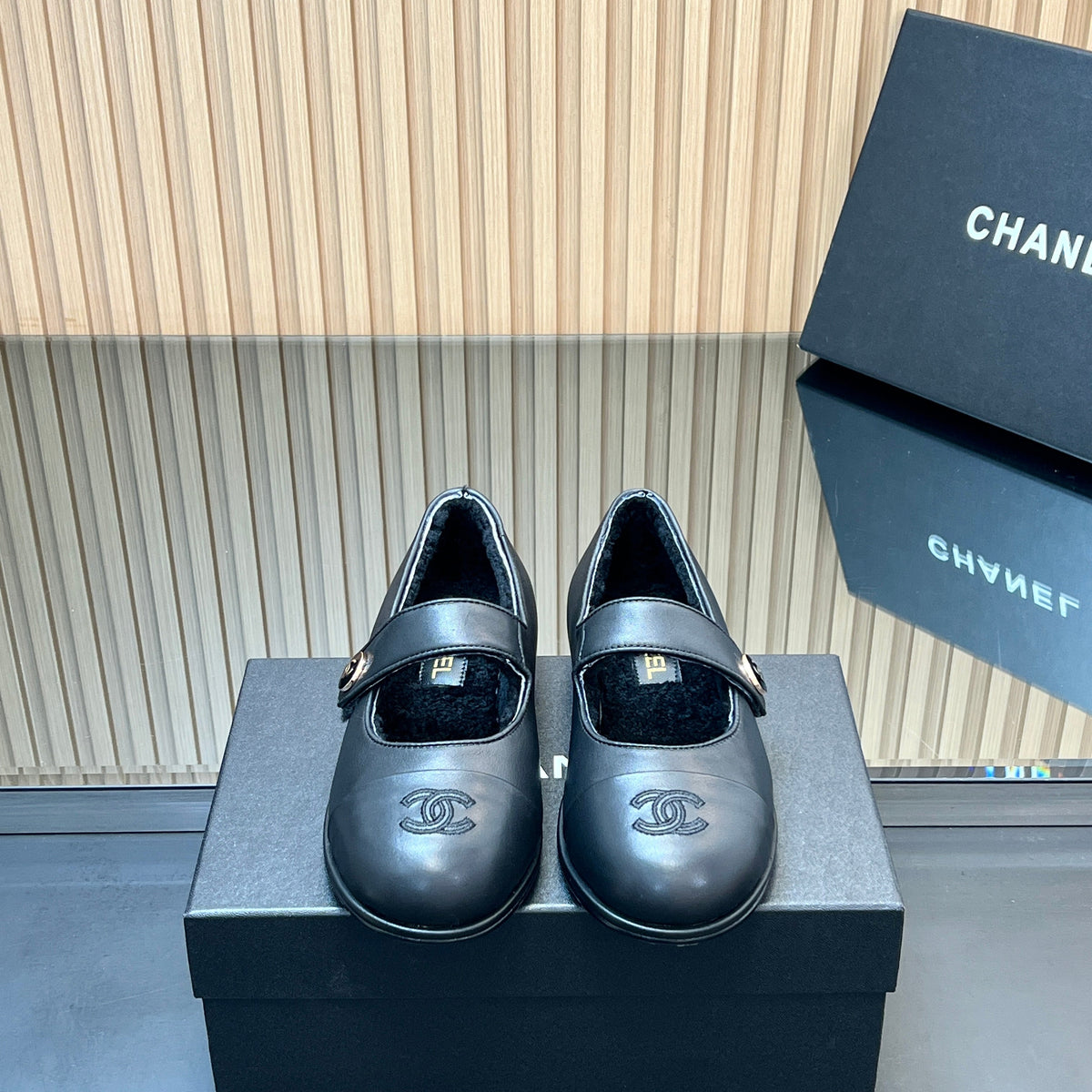 CHANEL 25S FURRY MARY JANE SHOES IN BLACK CALFSKIN