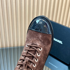 CHANEL 25S MARTIN LACE-UP BOOTS WITH CHAIN DETAIL IN DARK BROWN SUEDE