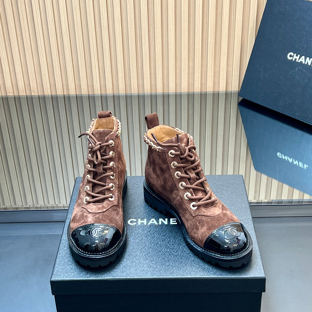 CHANEL 25S MARTIN LACE-UP BOOTS WITH CHAIN DETAIL IN DARK BROWN SUEDE