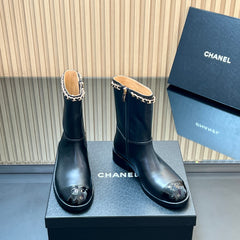 CHANEL 25S SHORT BOOTS WITH CHAIN IN BLACK CALFSKIN