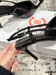 POINTED HIGH SLINGBACK IN BLACK PATENT CALFSKIN WITH CRYSTAL BUCKLE