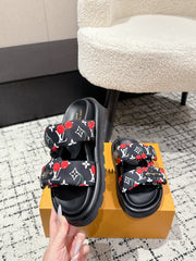 LV TWO-STRAP SLIDES 25S IN BLACK FABRIC AND CALFSKIN
