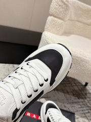 PRADA 25S MEN SNEAKERS LOGO IN WHITE AND BLACK NUBUCK AND CANVAS