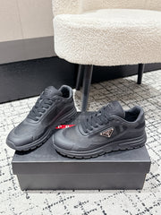 PRADA 25S MEN SNEAKERS IN BLACK CANVAS
