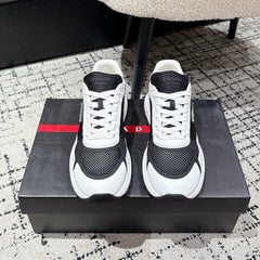 PRADA 25S MEN SNEAKERS IN BLACK AND WHITE CANVAS