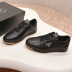 PRADA 25S DOWNTOWN SNEAKERS IN BLACK CALFSKIN