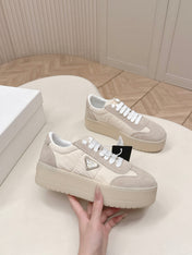 PRADA 26S PLATFORM SNEAKERS 50MM IN CREAM WHITE NYLON AND SUEDE