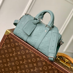 KEEPALL BANDOULIÈRE 25 BAG IN MISTY LAKE GREEN MONOGRAM TAURILLON CALFSKIN