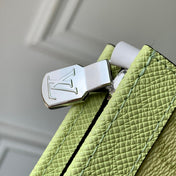 POCHETTE VOYAGE 26 IN LEMON YELLOW MONOGRAM ECLIPSE CALFSKIN