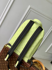 DISCOVERY SLIM BACKPACK 38 IN LEMON YELLOW MONOGRAM ECLIPSE REVERSE CALFSKIN
