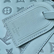 KEEPALL BANDOULIÈRE 50 IN SKY BLUE MONOGRAM SHADOW EMBOSSED CALFSKIN