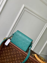 STEAMER WEARABLE WALLET 18 IN TEAL GREEN MONOGRAM TAURILLON CALFSKIN
