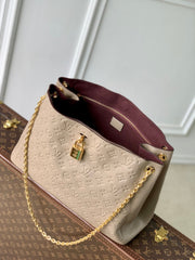 ANYTIME MM 42 IN TOURTERELLE GRAY MONOGRAM EMPREINTE CALFSKIN GOLD HARDWARE