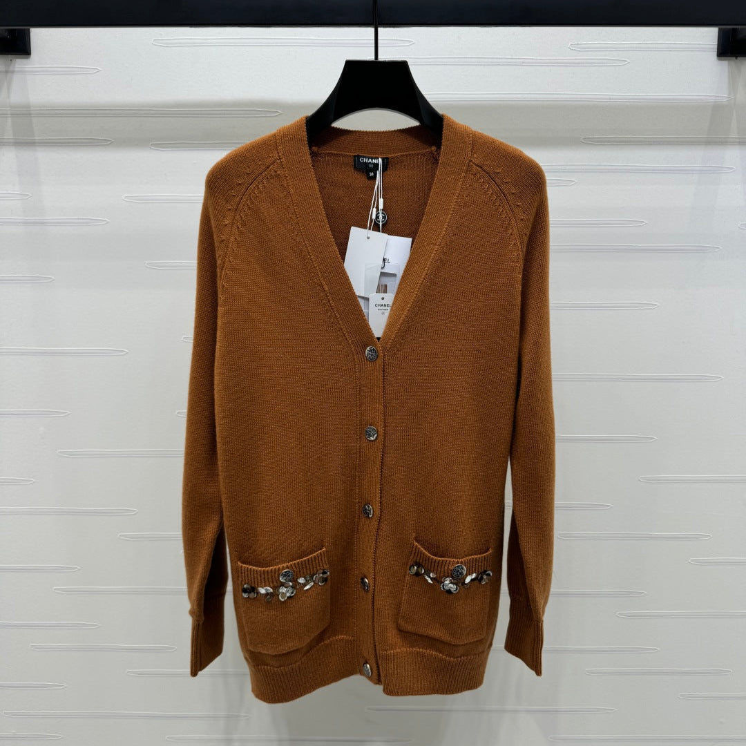 CHANEL HEAVY KNIT CARDIGAN WITH EMBELLISHED FLORAL DETAILS 274877