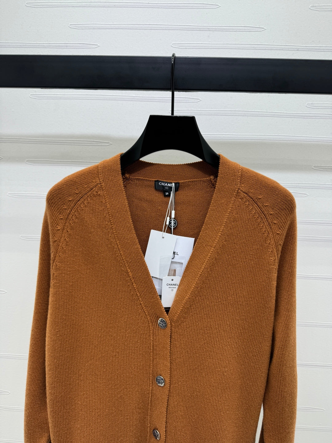 CHANEL HEAVY KNIT CARDIGAN WITH EMBELLISHED FLORAL DETAILS 274877